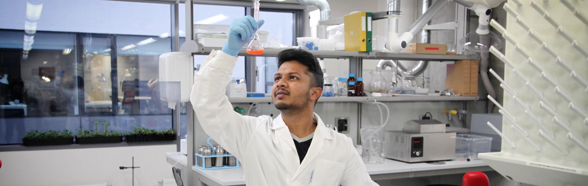 scientist observing a test in a lab