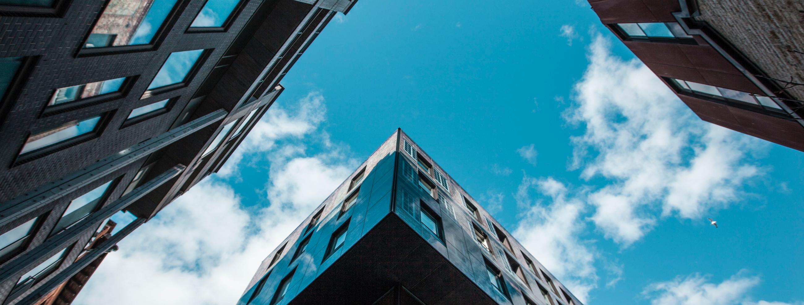 Photo by Marlene Leppänen: https://www.pexels.com/photo/low-angle-photo-of-skyscrapers-under-white-cloudy-sky-1031592/