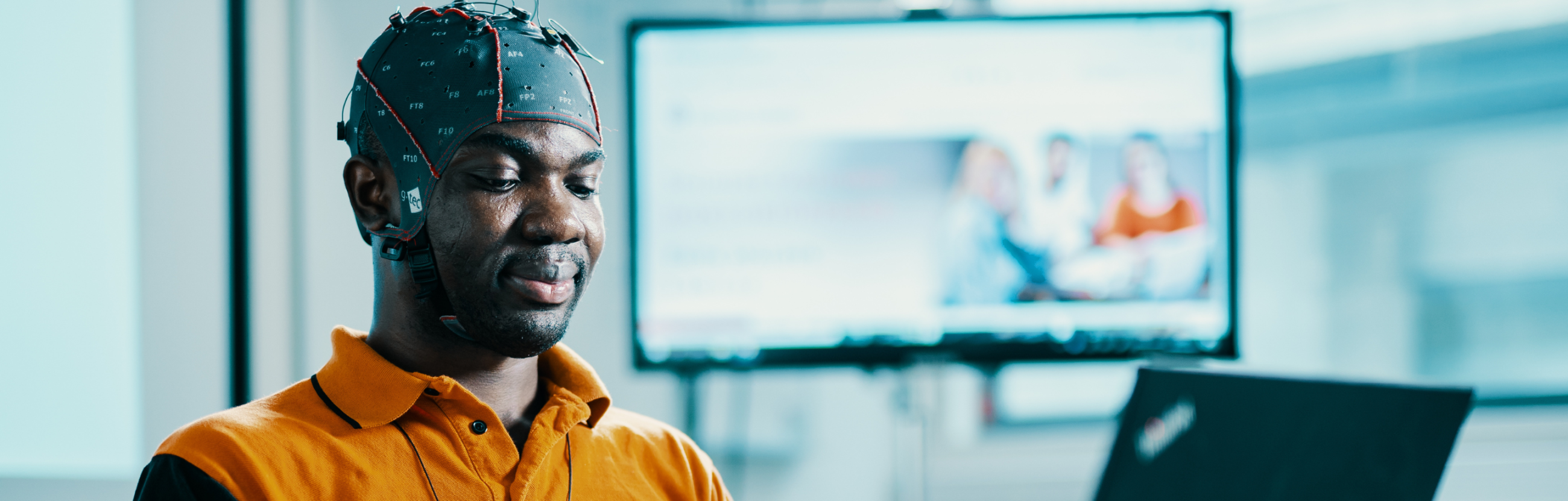 Student wearing an EEG cap during a research experiment at Tallinn University