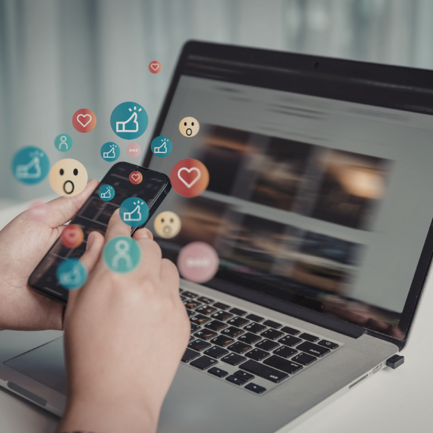 Illustrative photo of laptop and smartphone usage