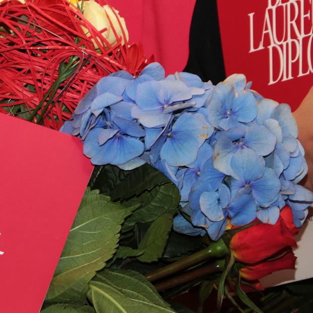 diplomas and flowers