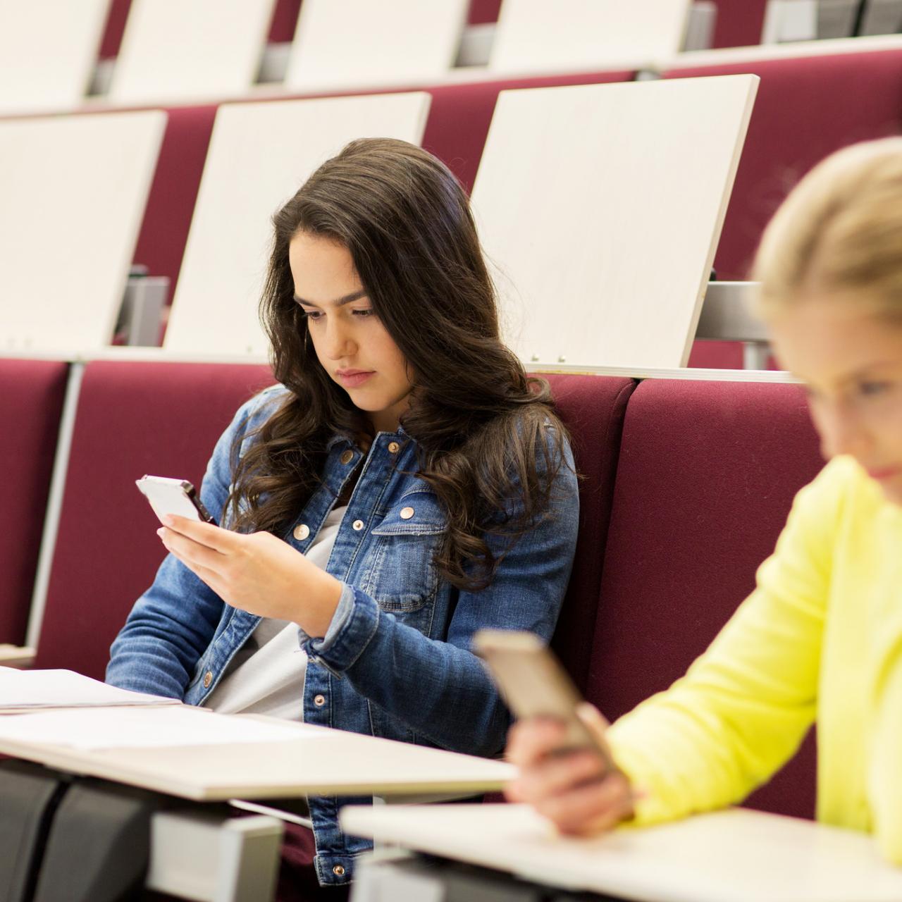 students looking at phones