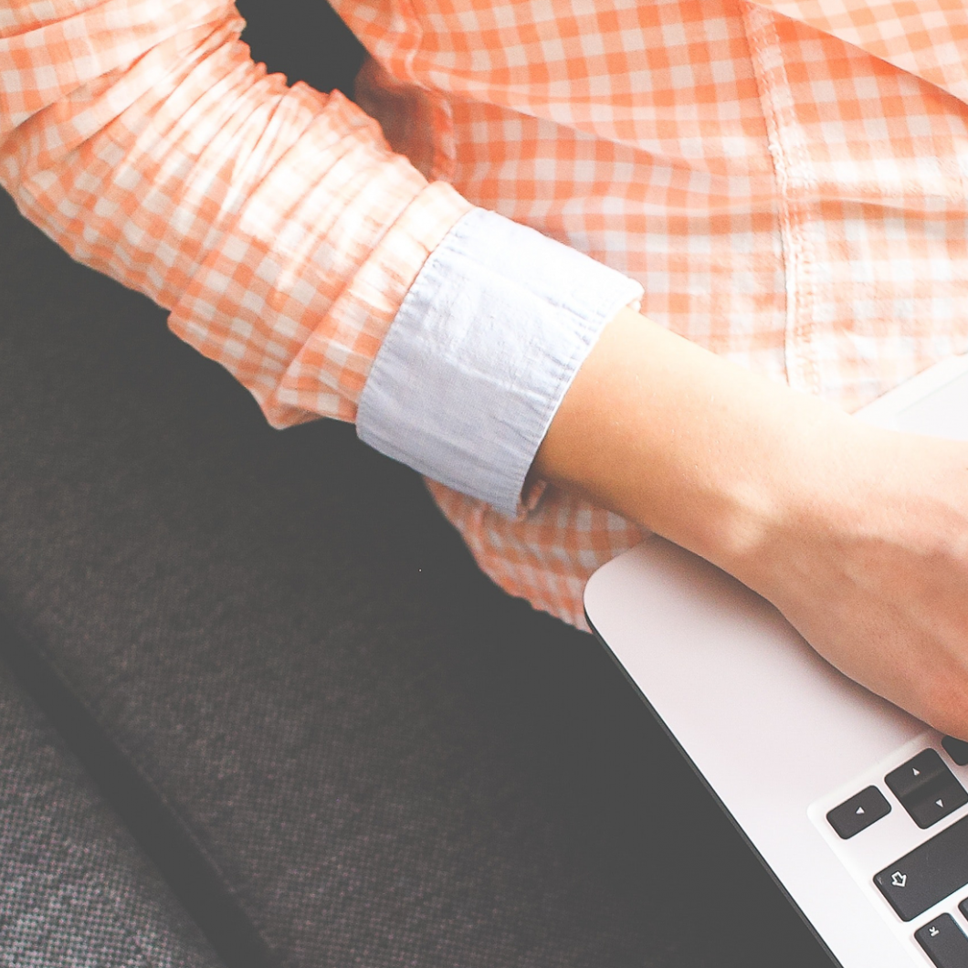 Woman holding a laptop